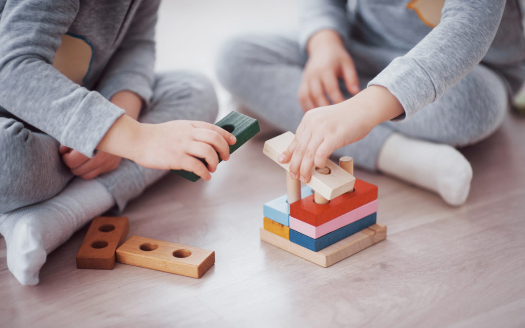 Children play with a toy